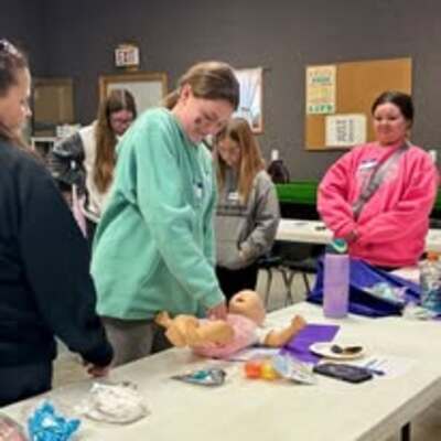 Practicing CPR at Babysitter Clinic 20256